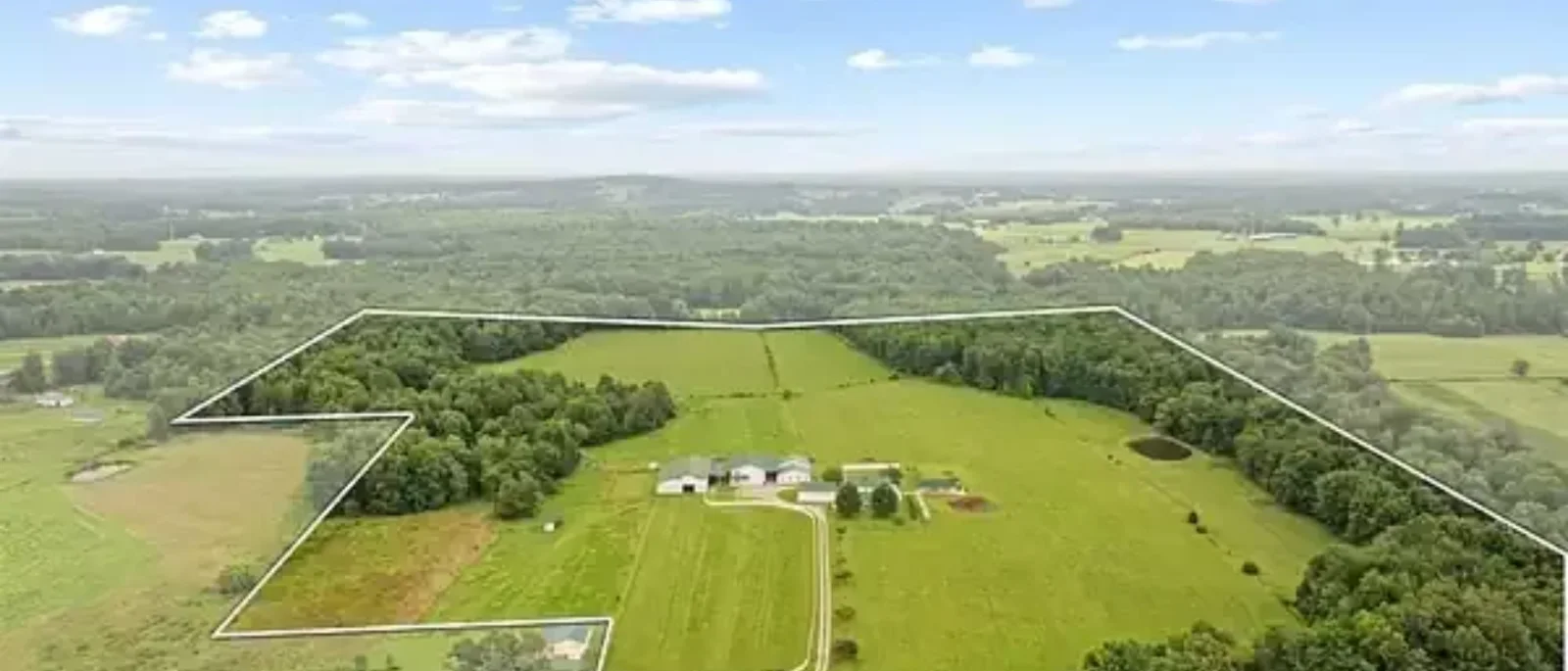 An aerial view of a Barren County farm with its property boundary marked